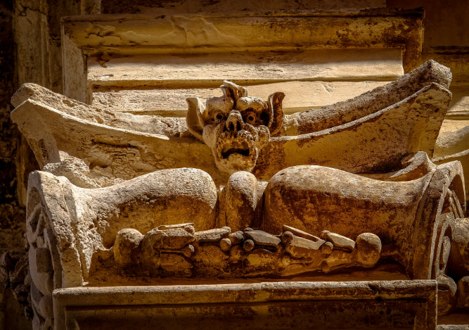 a concrete carving on the wall